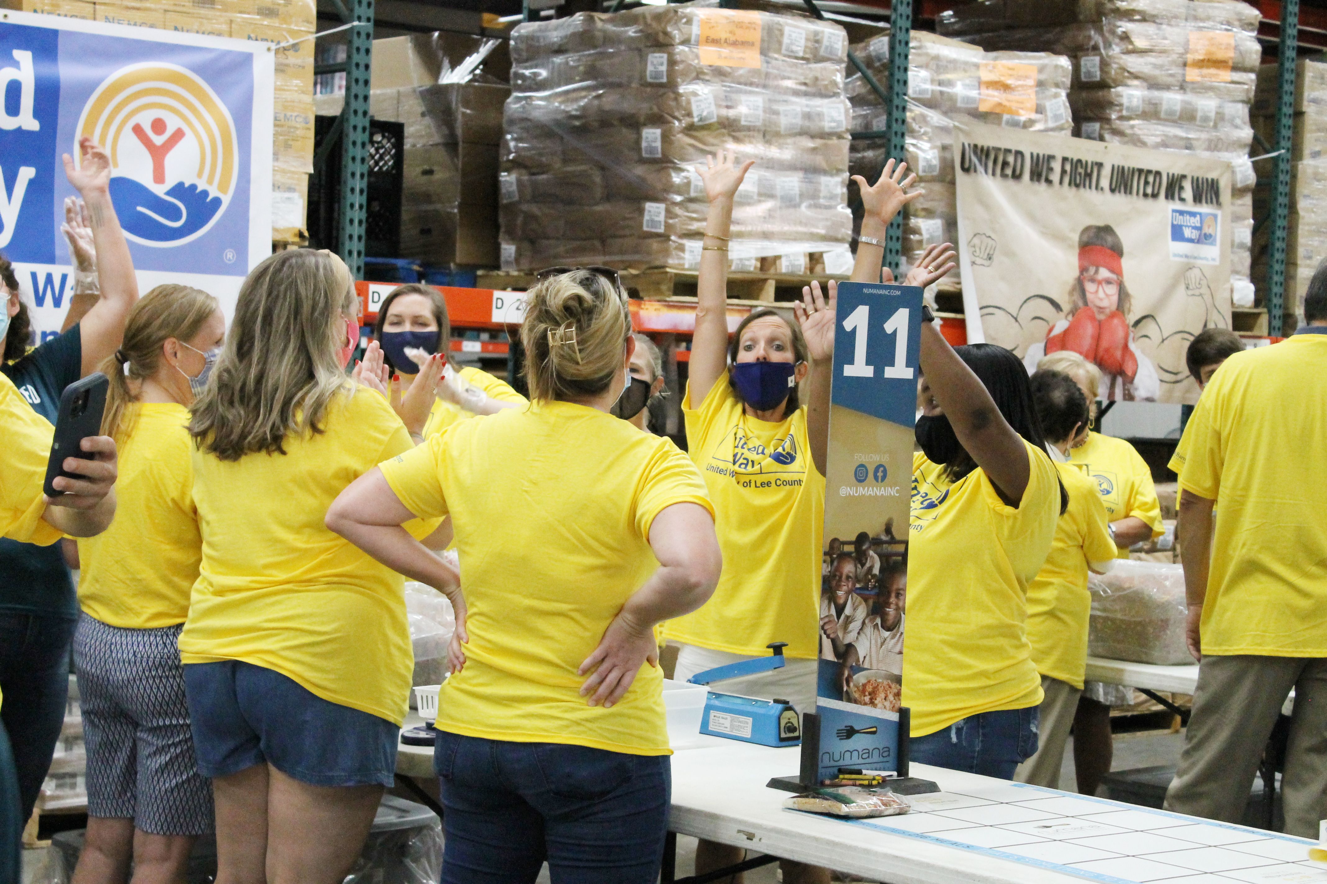 Volunteers packing food