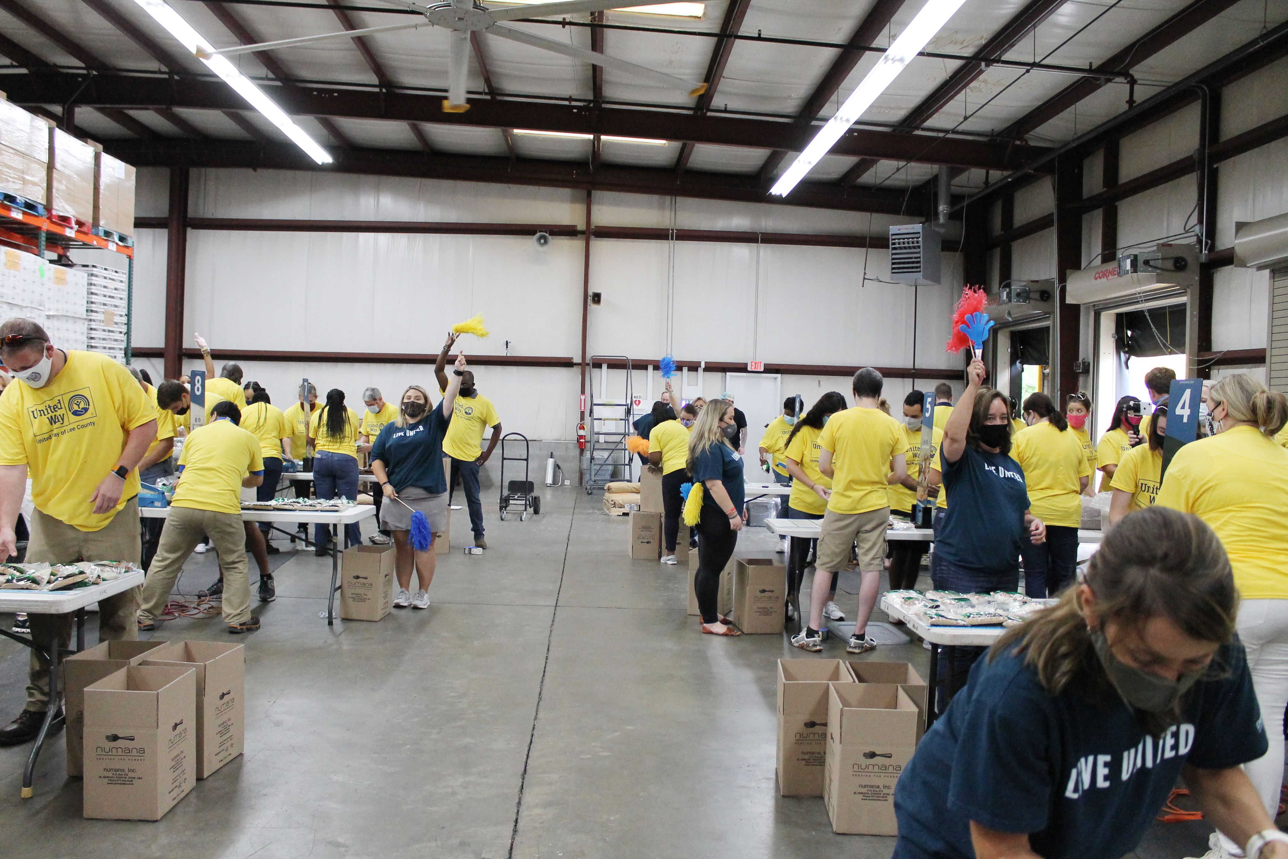 Volunteer packing food