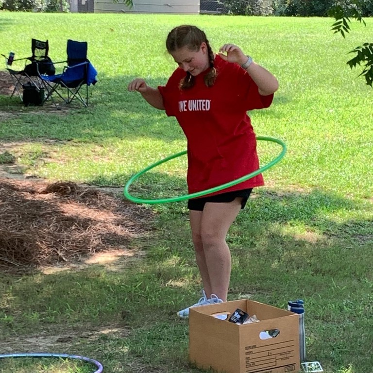 Volunteer hulahooping