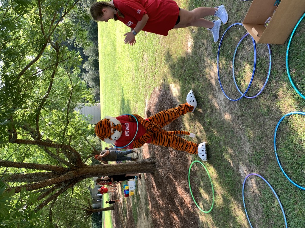 Aubie enjoying games with families