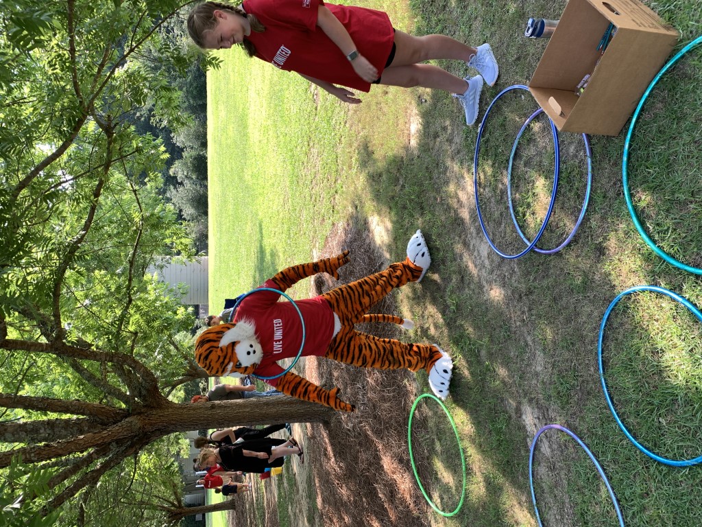 Aubie enjoying games with families