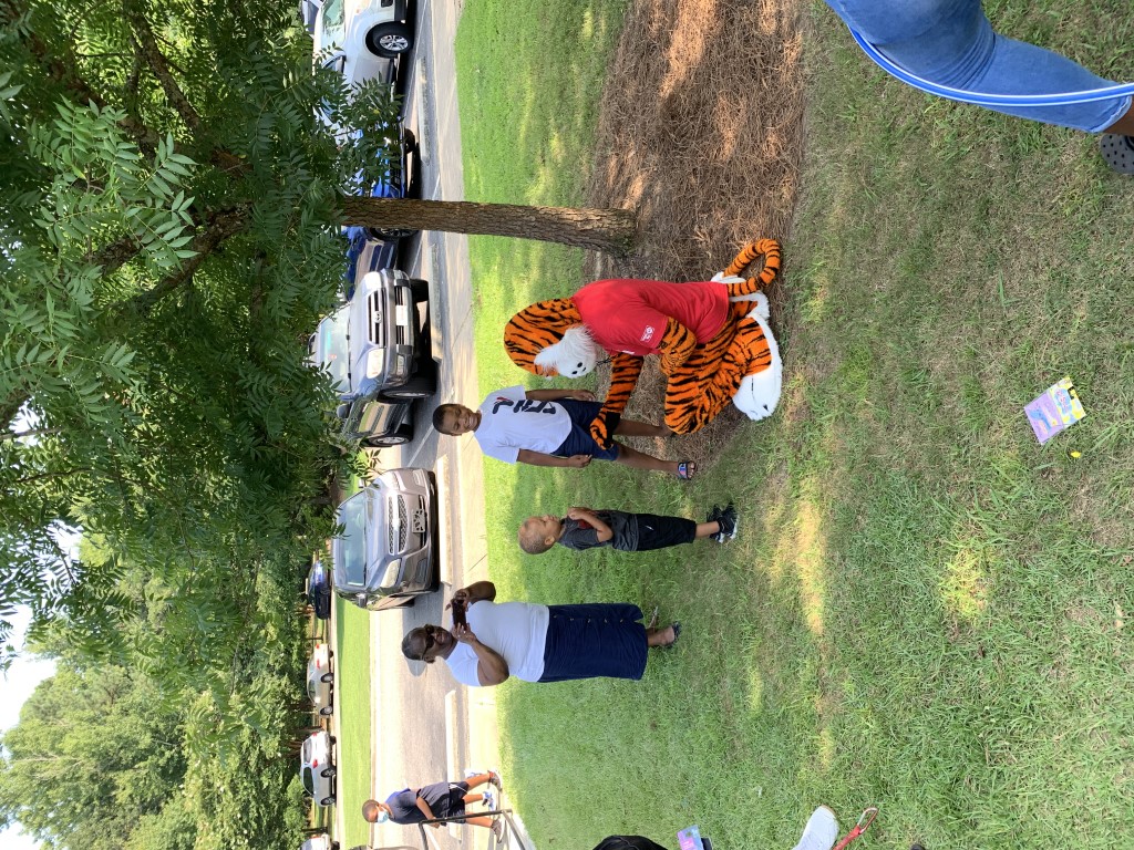 Aubie enjoying games with families