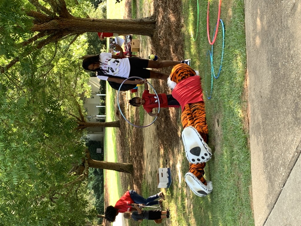 Aubie enjoying games with families