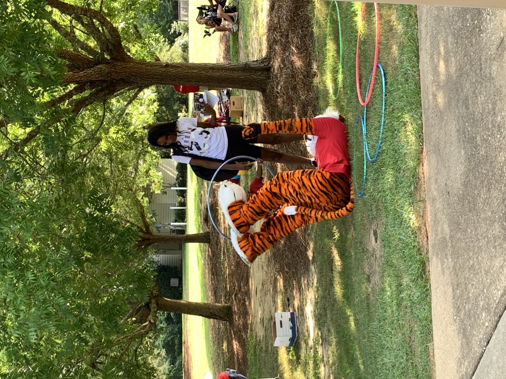 Aubie enjoying games with families