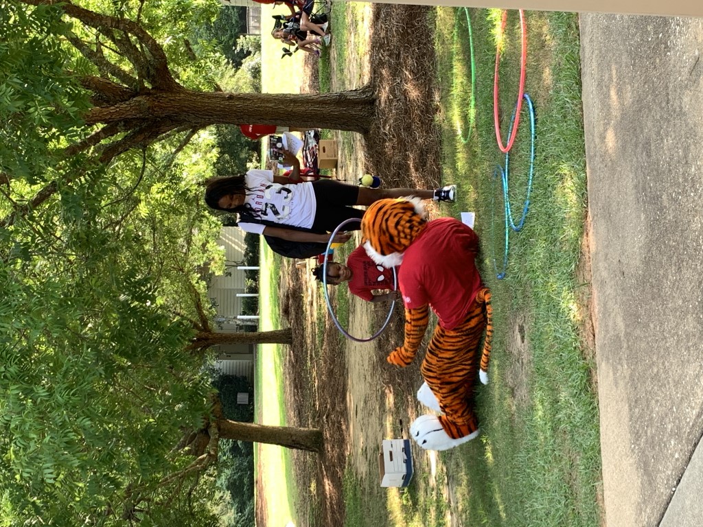 Aubie enjoying games with families