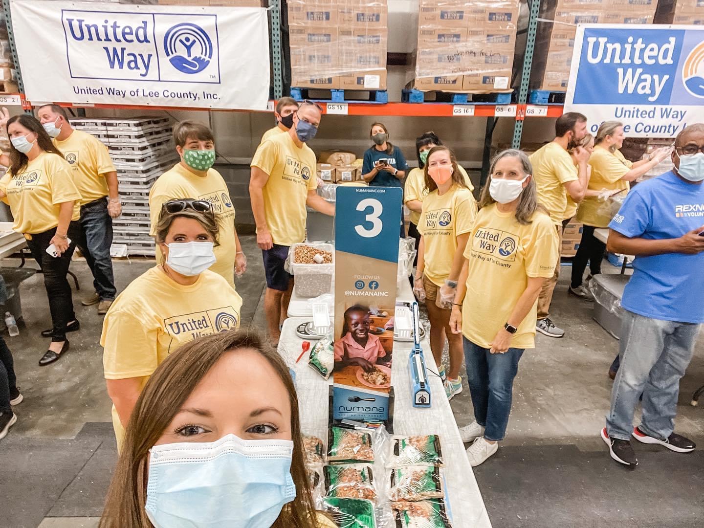 Volunteers packing food