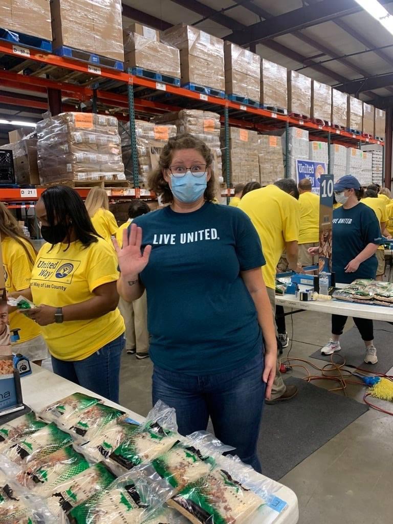 Volunteers packing food