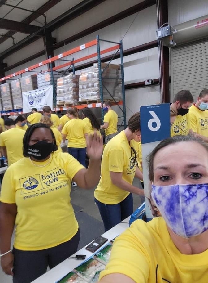 Volunteers packing food