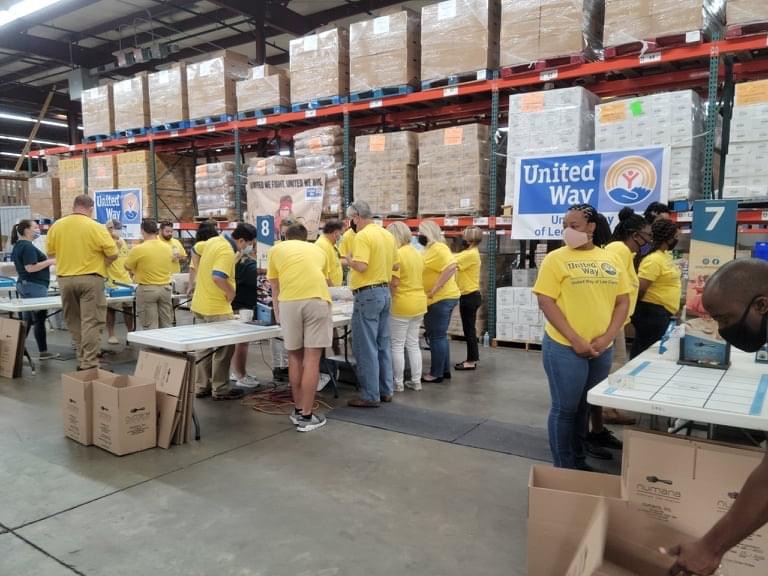 Volunteers  packing food