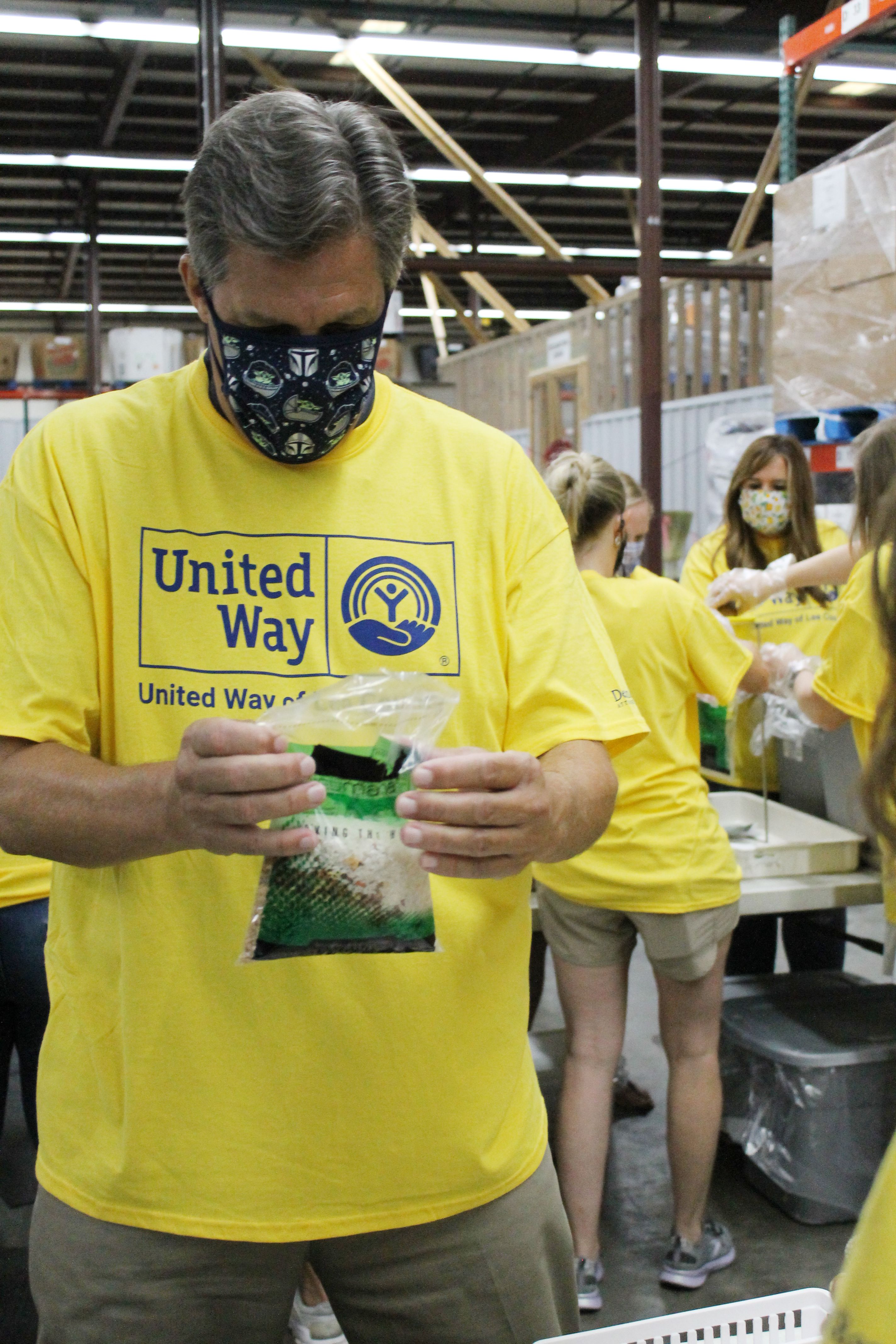 Volunteer packing food