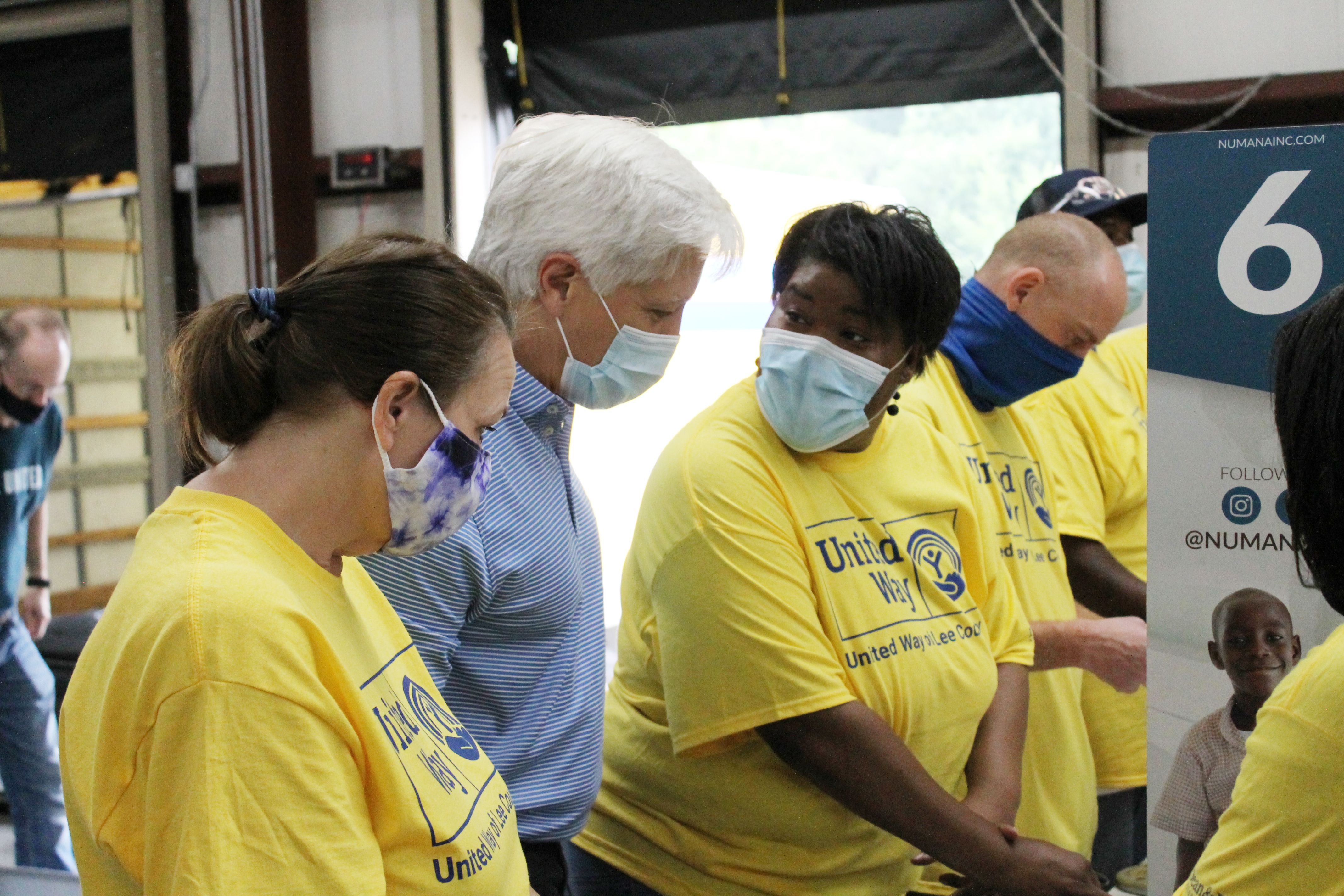 Volunteers packing food