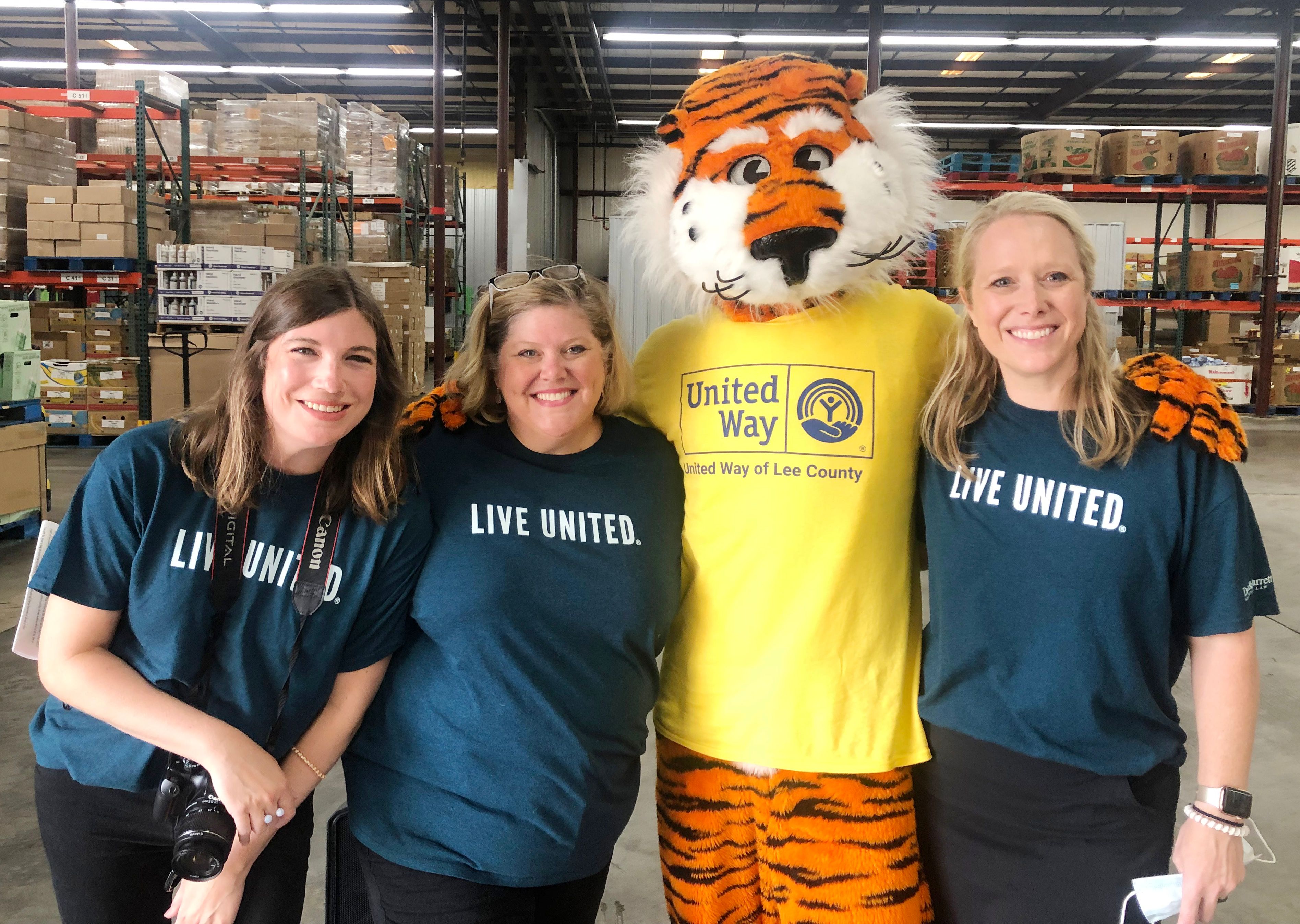 United Way Campaign Manager and Campaign Co-Chairs with Aubie